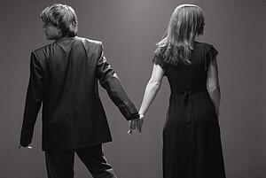 Couple looking in opposite directions