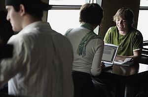 Teenager in discussion with another