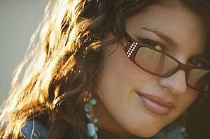 Attractive woman wearing trendy sunglasses