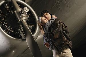 Pilot hugging child