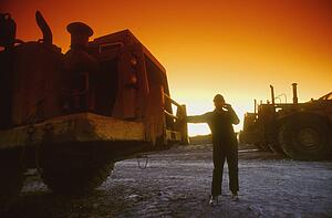 Early morning worker and vehicle