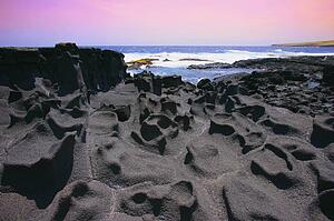 Lava rock near water