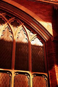 Arched window of brick building