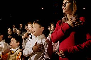 Group reciting sacrament