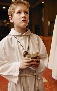 Alter boy holding container