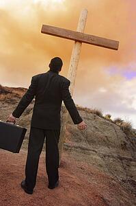 Businessman at cross