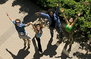 Group of friends jumping for joy