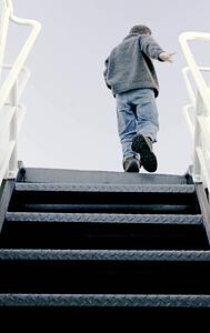 Person walking up stairs