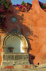 A carved stone water fountain