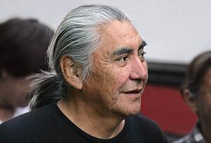 Senior man with long gray hair