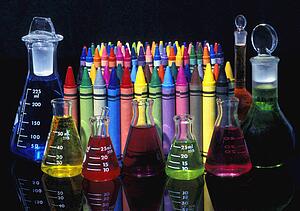 Wax crayons and measuring flasks