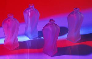 Four frosted bottles