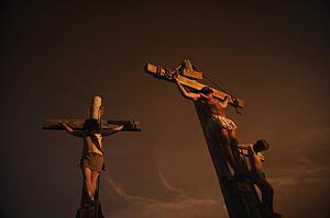 Jesus on cross with two others