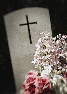 Headstone and flowers