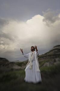 Jesus reaches up