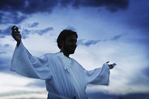 Man with arms outstretched