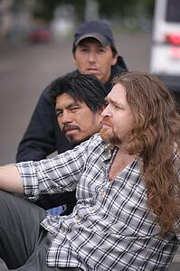 Three men sitting