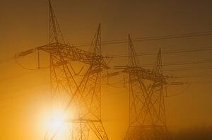 Silhouette of electricity pylons