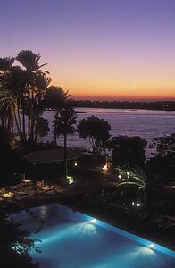 View over swimming pool, hotel, Nile River, Luxor, Egypt