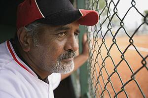 Baseball player in dugout