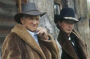 Portrait of a pair of cowboys