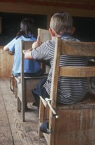 Children in an old classroom