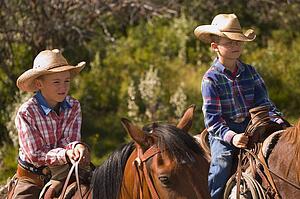 Two boys on horses