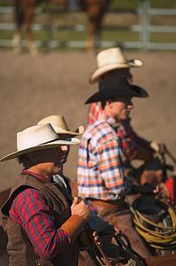 Cowboys look on