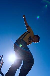 A teenager attempts a stunt