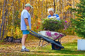 Couple doing yard work