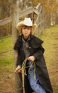 Portrait of young cowboy