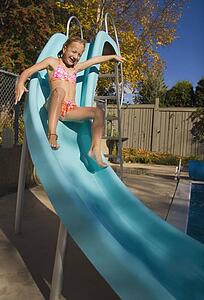 Sliding down a slide