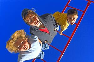 Kids hang upside down