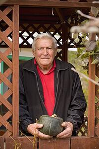 A senior with a squash