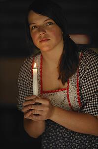 Woman holding candle