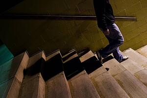 Person walking down stairs