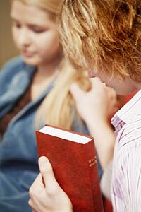 Teen prays for another