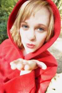 Girl blows a kiss