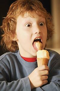 Child eats ice cream