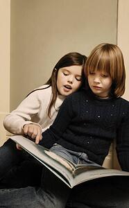 Children looking at story book