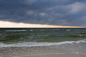Storm clouds over the surf