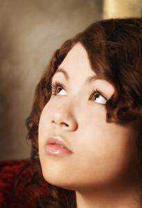 Portrait of a woman looking up