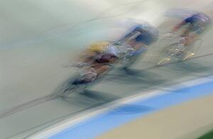Cyclists racing on bike track
