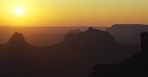 Sun setting over Grand Canyon buttes, Grand Canyon National Park