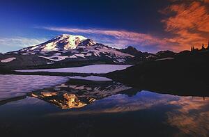 Mount Rainier and reflection in pond at sunrise.