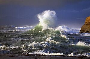 Wave crashing, distant storm, Cape Kiwanda