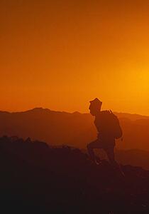 Hiker silhouette, sunset on Aneroid Mountain, Eaglecap Wilderness