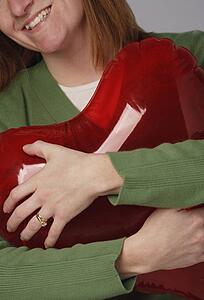 Woman hugging heart