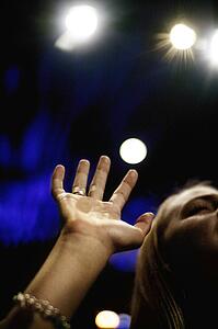 Woman praising God