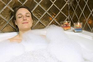 Woman having a bubble bath
